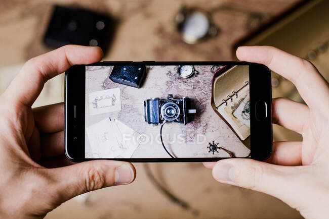 Man take picture of flat lay on the phone — Stock Photo