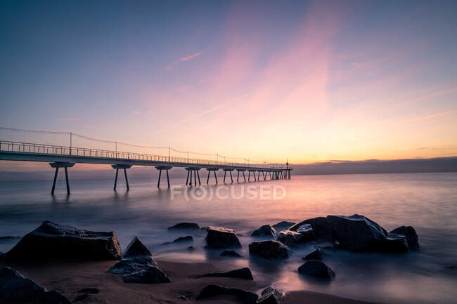 Bridge sunset sunrise color clouds — Stock Photo