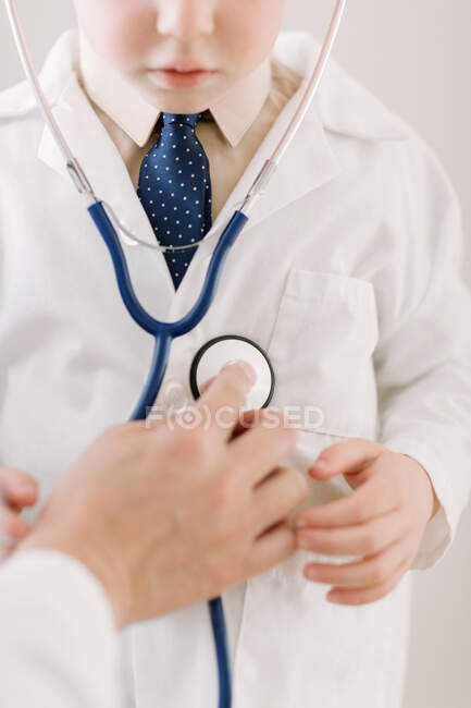 Child in labcoat with stethoscope — Stock Photo