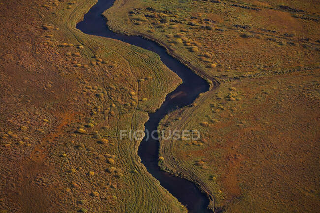 Aerial shoot of a nameless river - foto de stock