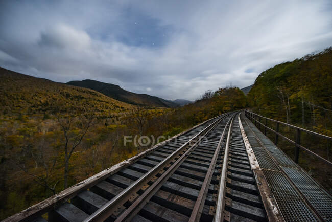 Abandoned Railroad Trestle high above New england autumn forest — Stock Photo