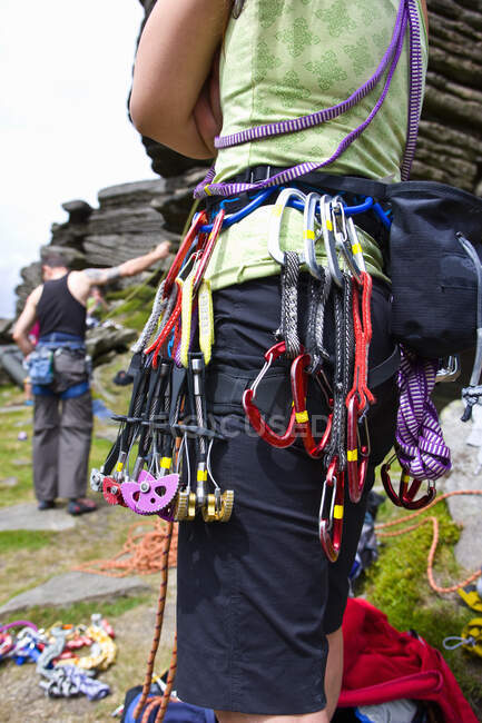 Close up of climbing gear on rock climbing harness — Stock Photo
