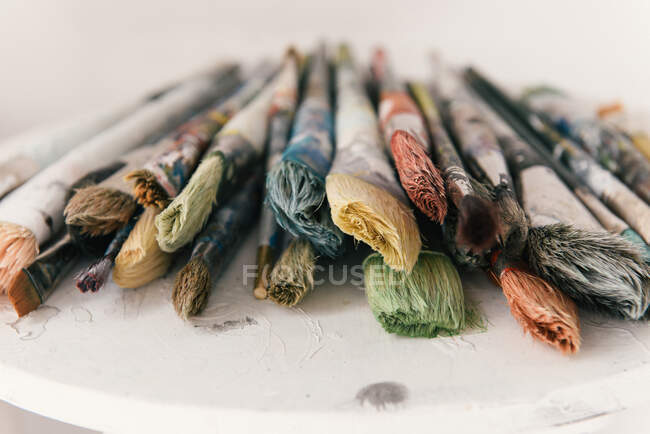 Colorful paint brushes on white background — Stock Photo