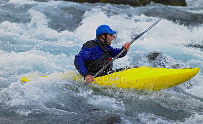 Man going on his white water kayak  rapids in an Icelandic river — Stock Photo