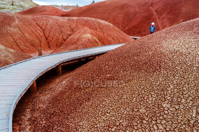 Young woman walking on boardwalk at Painted Hills — Stock Photo