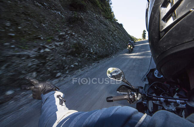 Men driving on a touring motorbikes on Ruta 7 - the Carretera Austral — Stock Photo