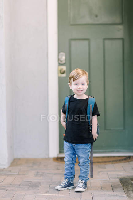 First day of preschool photo at home with backpack — Stock Photo