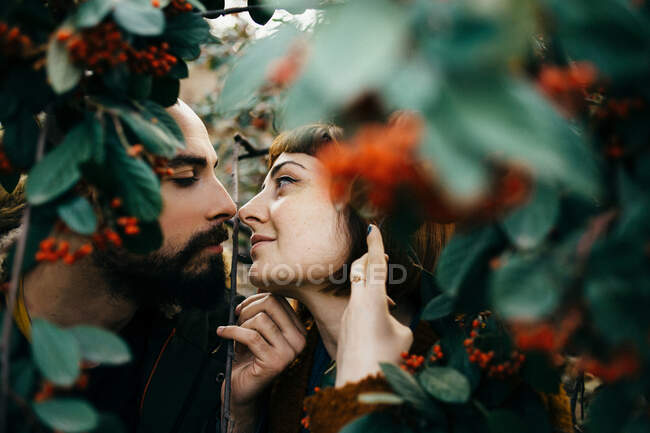 Lover in flowers park tbilisi — Stock Photo