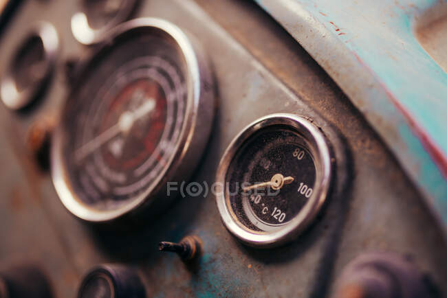 Old tractor dashboard. Temperature scale closeup. — Stock Photo