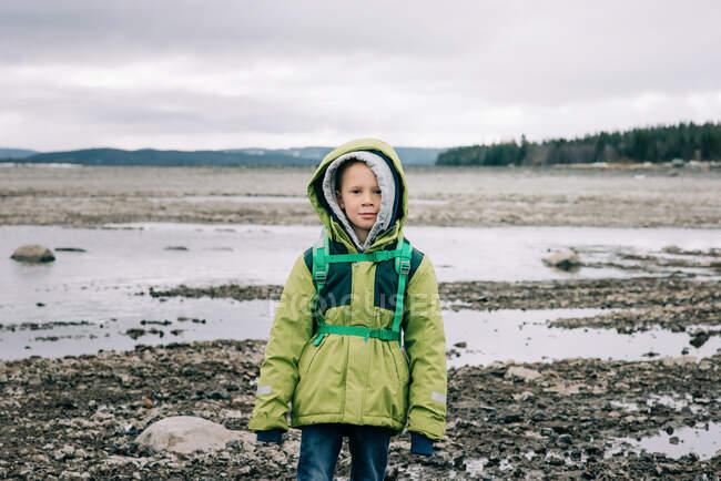 Portrait of a young boy alone hiking in northern Sweden — Stock Photo