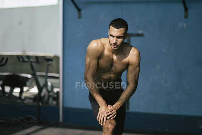 Portrait of male African American athlete at gym — Stock Photo