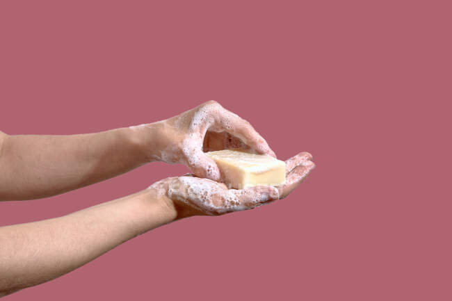 Close up hands with soap on background, the concept of hygiene, health care — Stock Photo