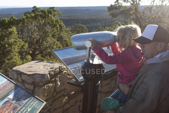 Canyon lands overlook child and father — Stock Photo