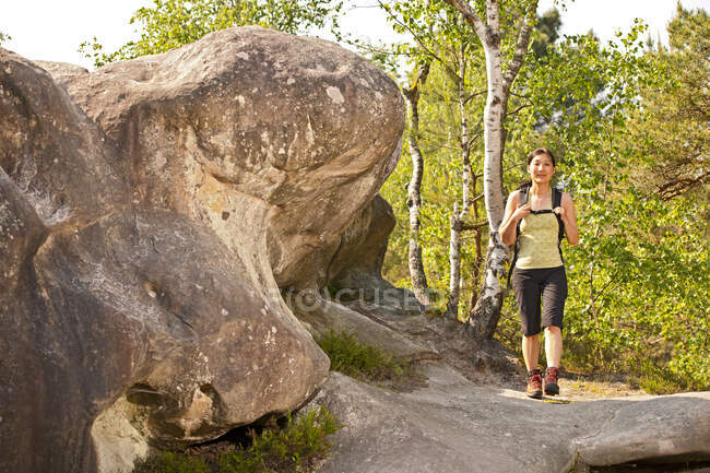 Mature woman exploring the forest of Fontainebleau close to Paris — Stock Photo