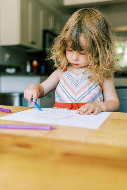 Stock portrait of a little toddler girl drawing — Stock Photo
