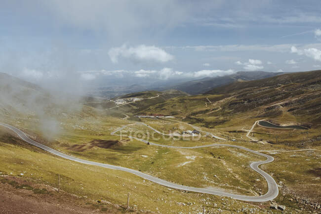 Winding road up to the mountains in Alto Campoo, Cantabria, Spain — Stock Photo