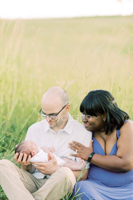 Happy parents with their newborn son — Stock Photo