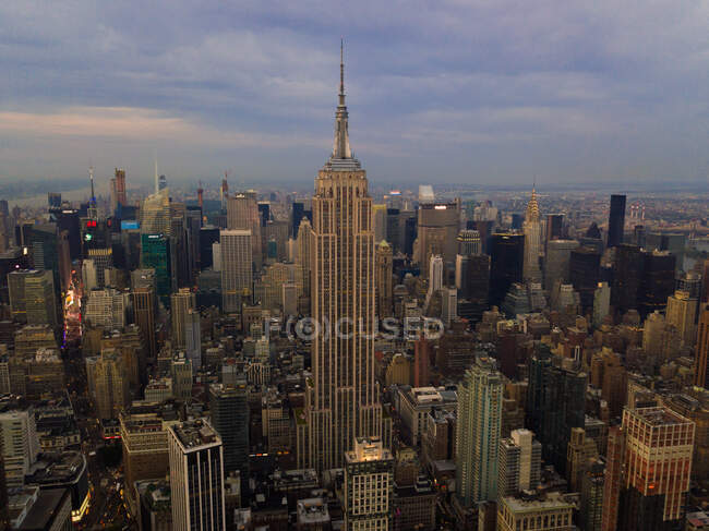 The Heart of Manhattan, Empire State Building in New York City Aerial Drone View on Rainy Cloudy Day HQ — Stock Photo