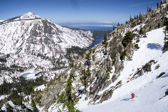 Mid forties man skiing down backcountry at Washington Pass — Stock Photo