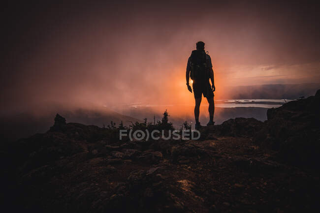 Silhouette of hiker at sunset in the clouds, Appalachian Trail, Maine — Stock Photo
