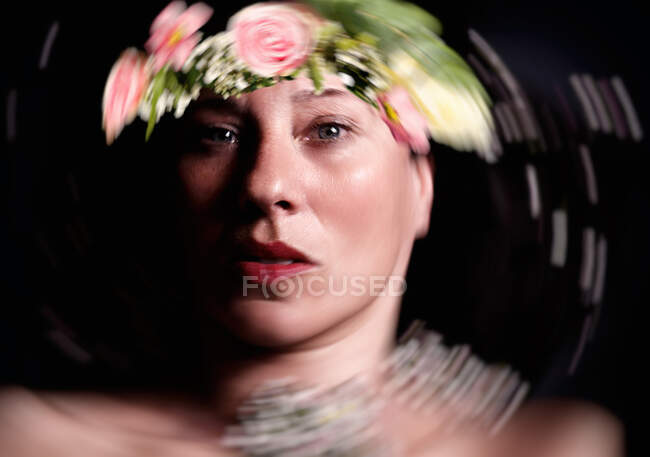 Real beauty in adulthood with flowers — Stock Photo