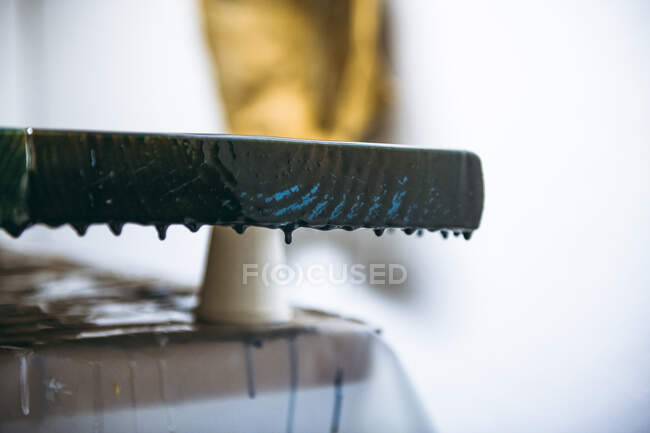 Detail of wet resin art drying over woodgrain — Stock Photo