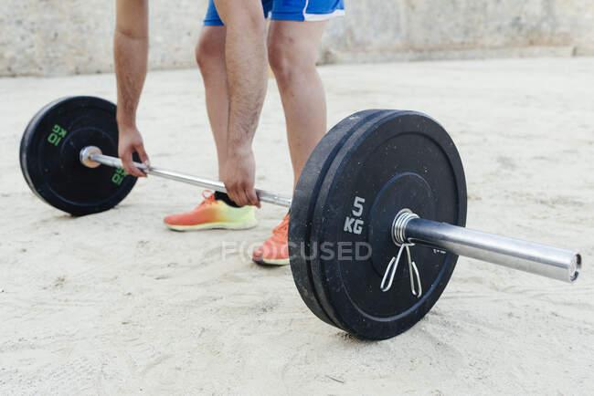Close up of legs and arms of a sportsman doing urban crossfit — Stock Photo