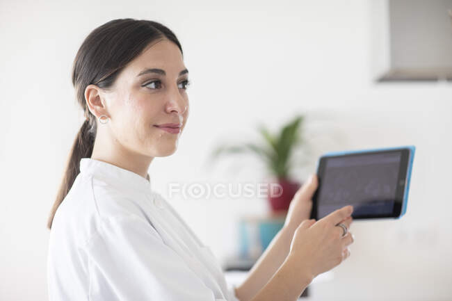 Young female doctor in a practice — Stock Photo