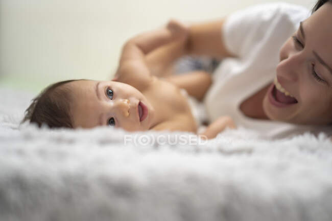 Mother enjoying with her baby — Stock Photo