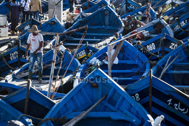 Cluster of blue Moroccan fishing boats — Stock Photo