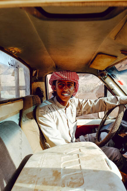 Portrait of a Bedouin man in his truck, Wadi Rum, Jordan — Stock Photo