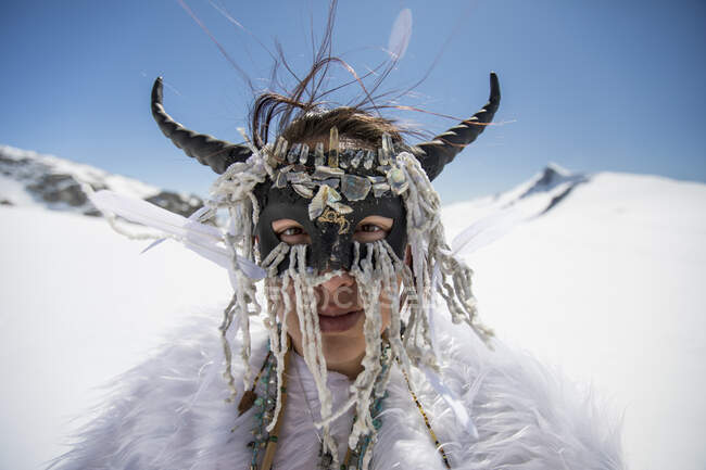 Aboriginal girl wearing face mask, dressed as mountain goat. — Stock Photo