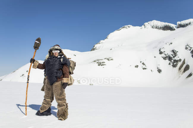Native American explorer dressed in traditional fur clothing. — Stock Photo