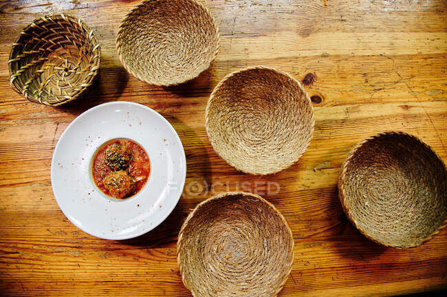 Set of bread in a restaurant with meatball dish — Stock Photo