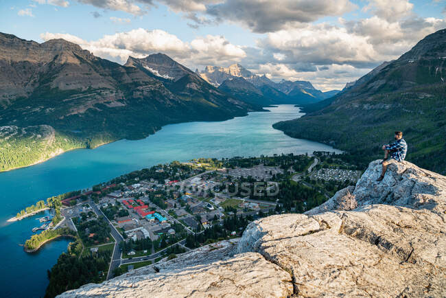 Hiker Watching the Sunset Over Waterton National Park in Alberta — Stock Photo