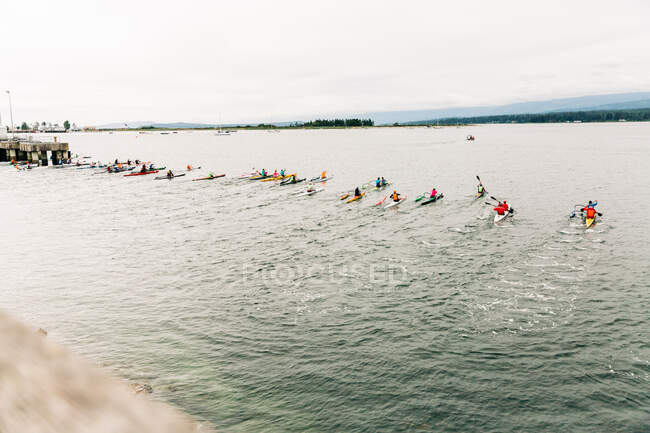 Kayak race bright colours on the ocean — Stock Photo
