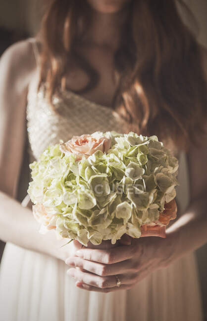 Woman Holding Bouquet of Flowers — Stock Photo