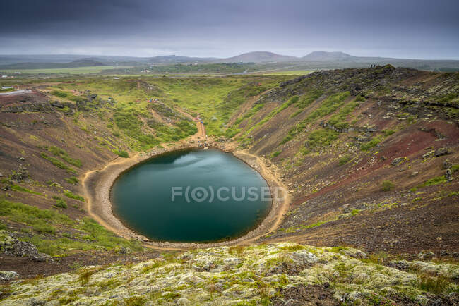 Beautiful natural landscape with volcanic crater lake — Stock Photo