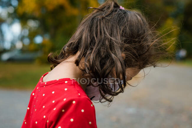 Three year old mixed race girl wearing face mask outdoor fall portrait — Stock Photo