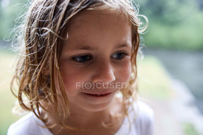Portrait of girl with wet hair and water droplets  on cheeks — Stock Photo