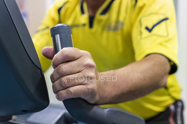 Cropped shot of mature man working out during rehabilitation — Stock Photo