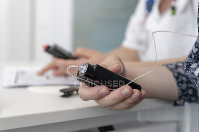 Cropped shot of person holding medical tool — Stock Photo