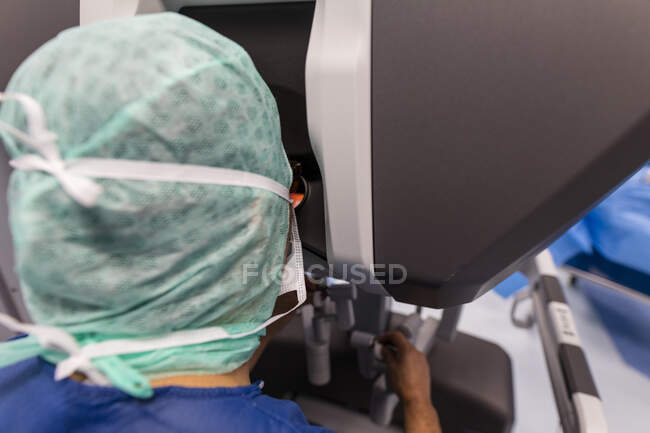 Close-up shot of surgeon in operating room at work — Stock Photo