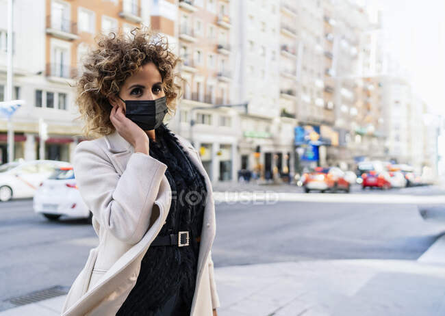 Portrait of afro hair woman with mask — Stock Photo