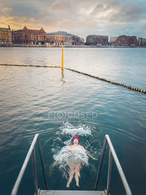 Laughing Winter Bather Making Waves In Still Water Copenhagen, Denmark — Stock Photo