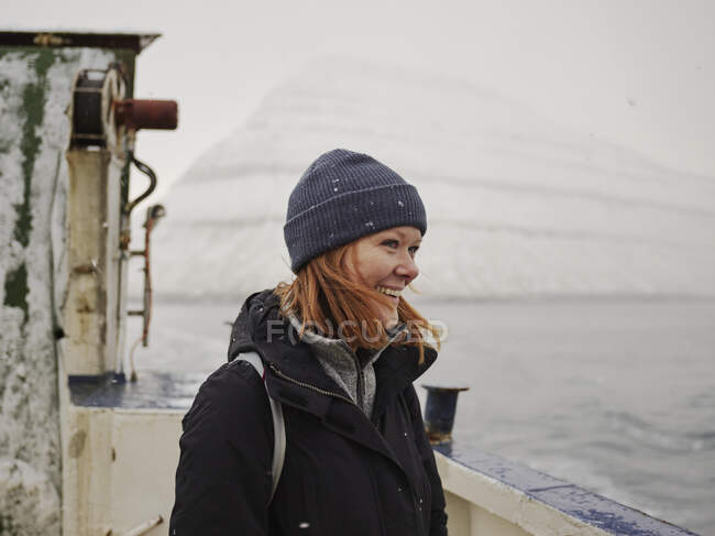 Young woman standing on the ferry — Stock Photo