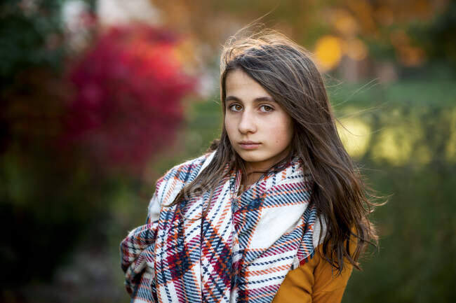 Portrait of teen girl 11-13 years old in warm clothes on fall day — Stock Photo