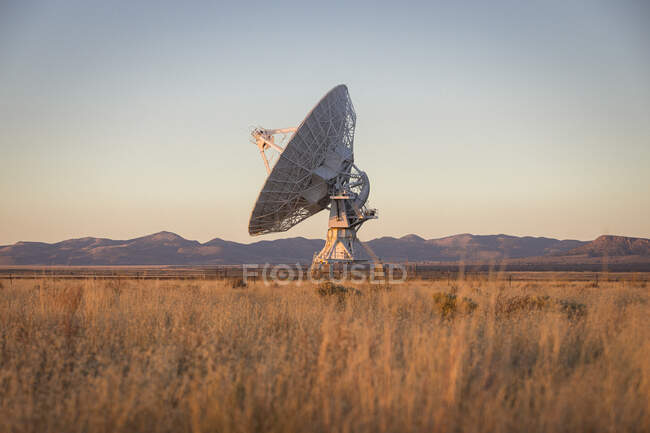 Satellite dish with antenna and telescope — Stock Photo
