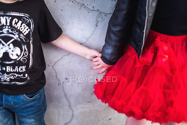 Cute little boy and girl holding hands — Stock Photo