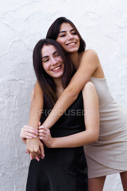Two Spanish Teen Sisters Hug Each Other Funny — Stock Photo